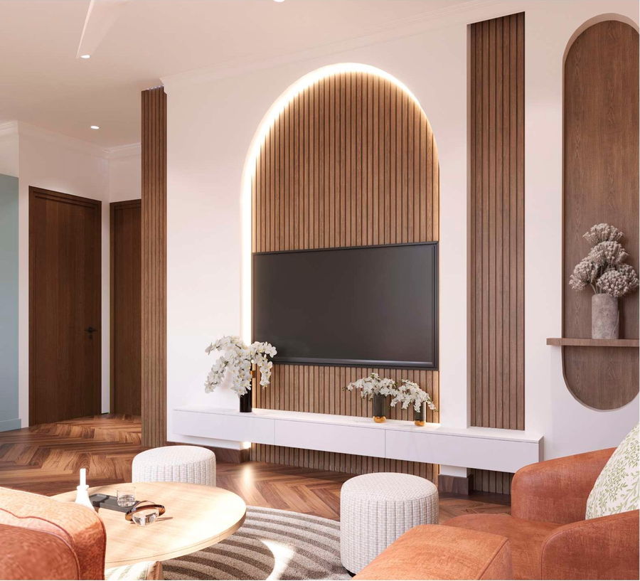 Living room with fluted wood television wall, backlit arched niche and a rust-coloured sofa