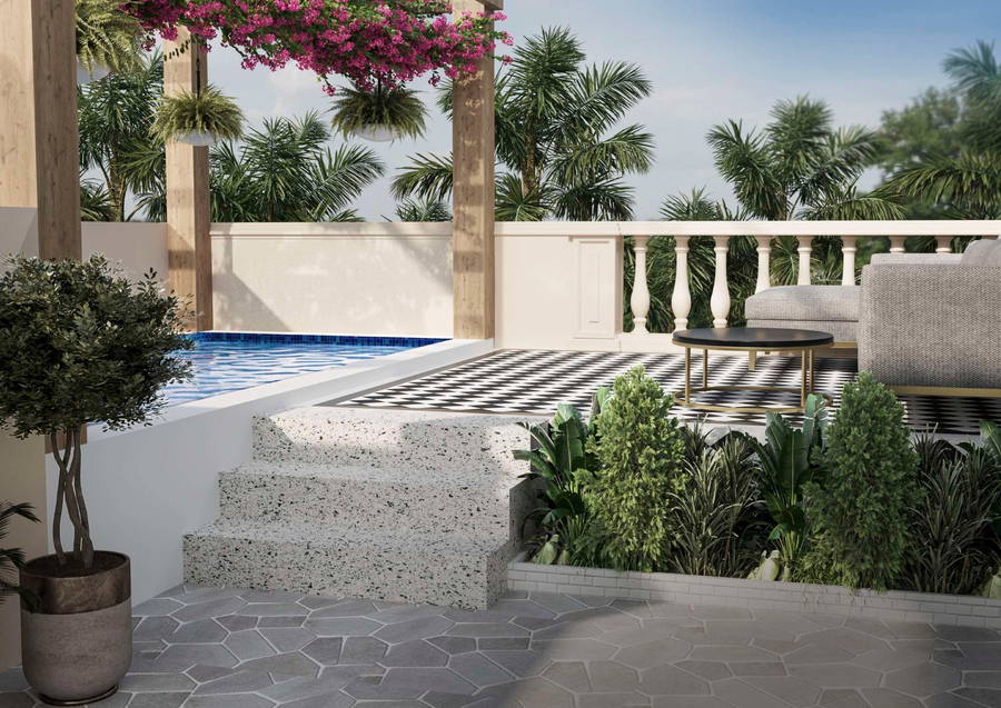 A private plunge pool on an apartment terrace, with covered seating, bougainvillea overhead and patterned stone decking
